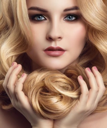 blond-woman-with-long-curly-beautiful-hair-close-2022-02-24-20-25-27-utc (1)